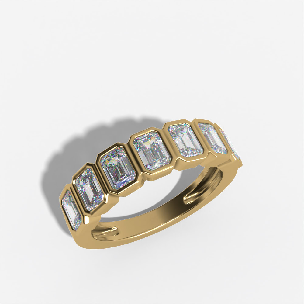 Bezel-set emerald-cut diamond band in yellow gold, angled view