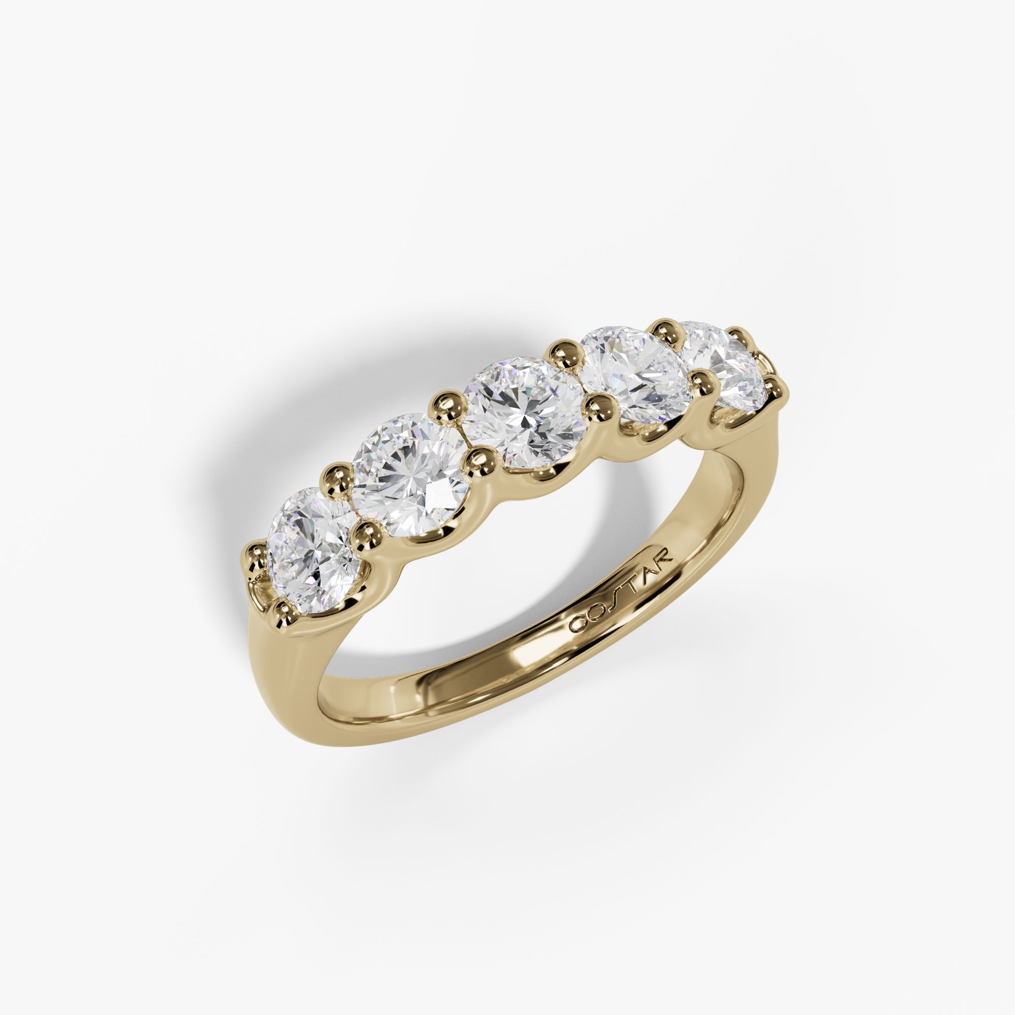 Yellow gold U-prong five-stone diamond band, angled view