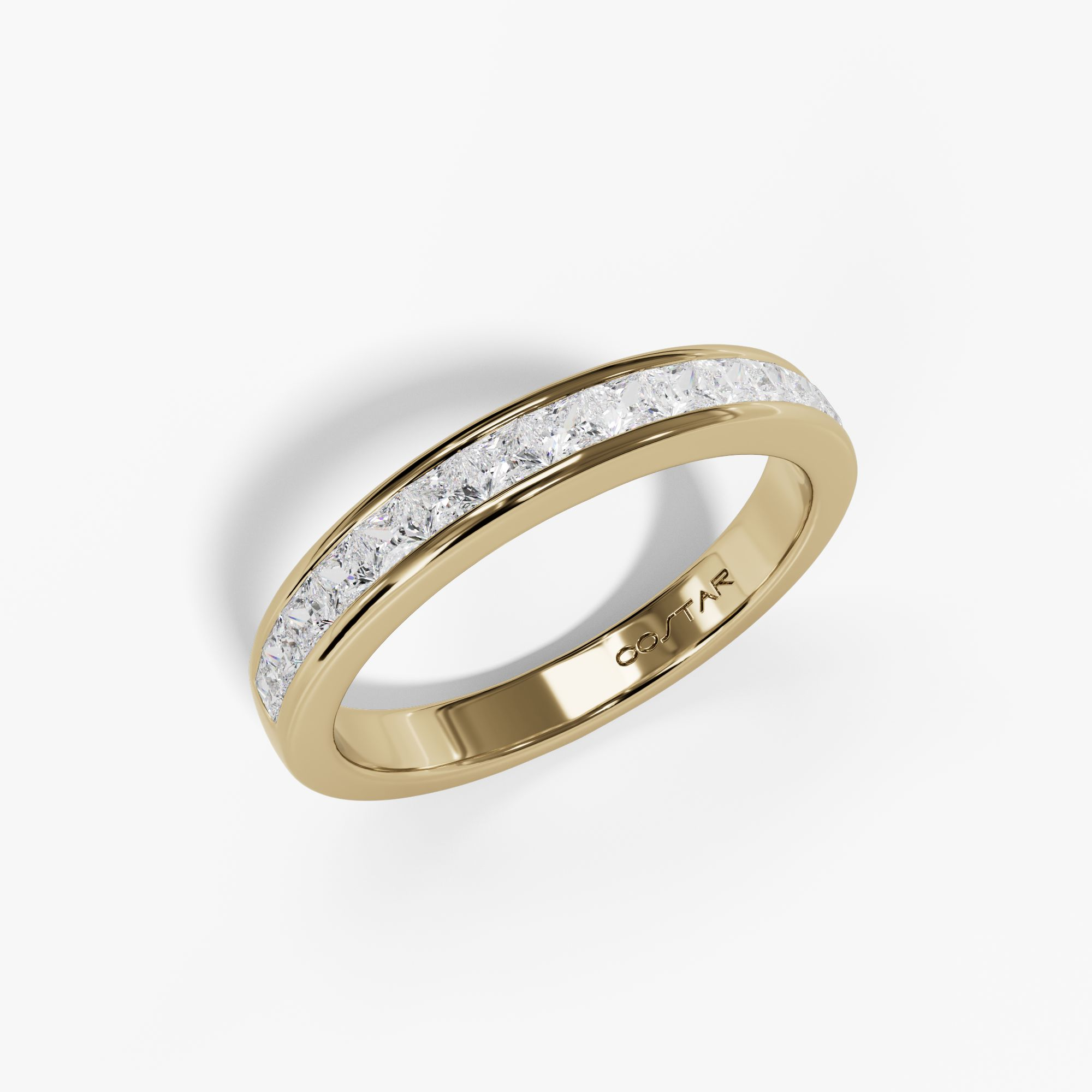 Channel-set princess diamond band in yellow gold, angled view