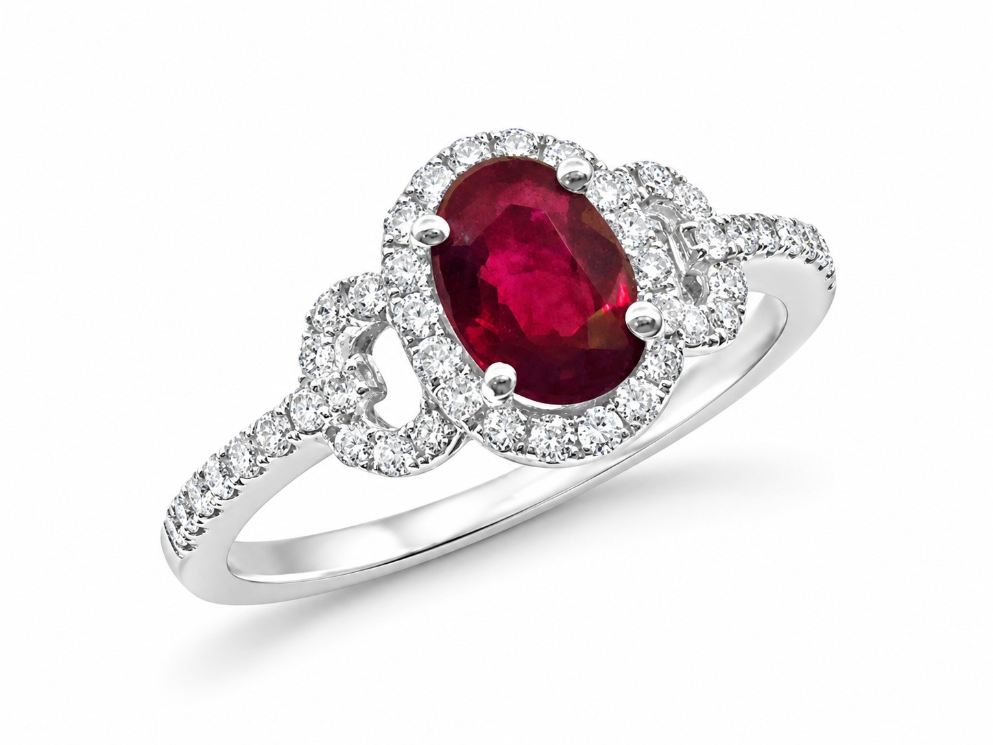 Ruby statement ring in 14K gold framed by natural diamonds