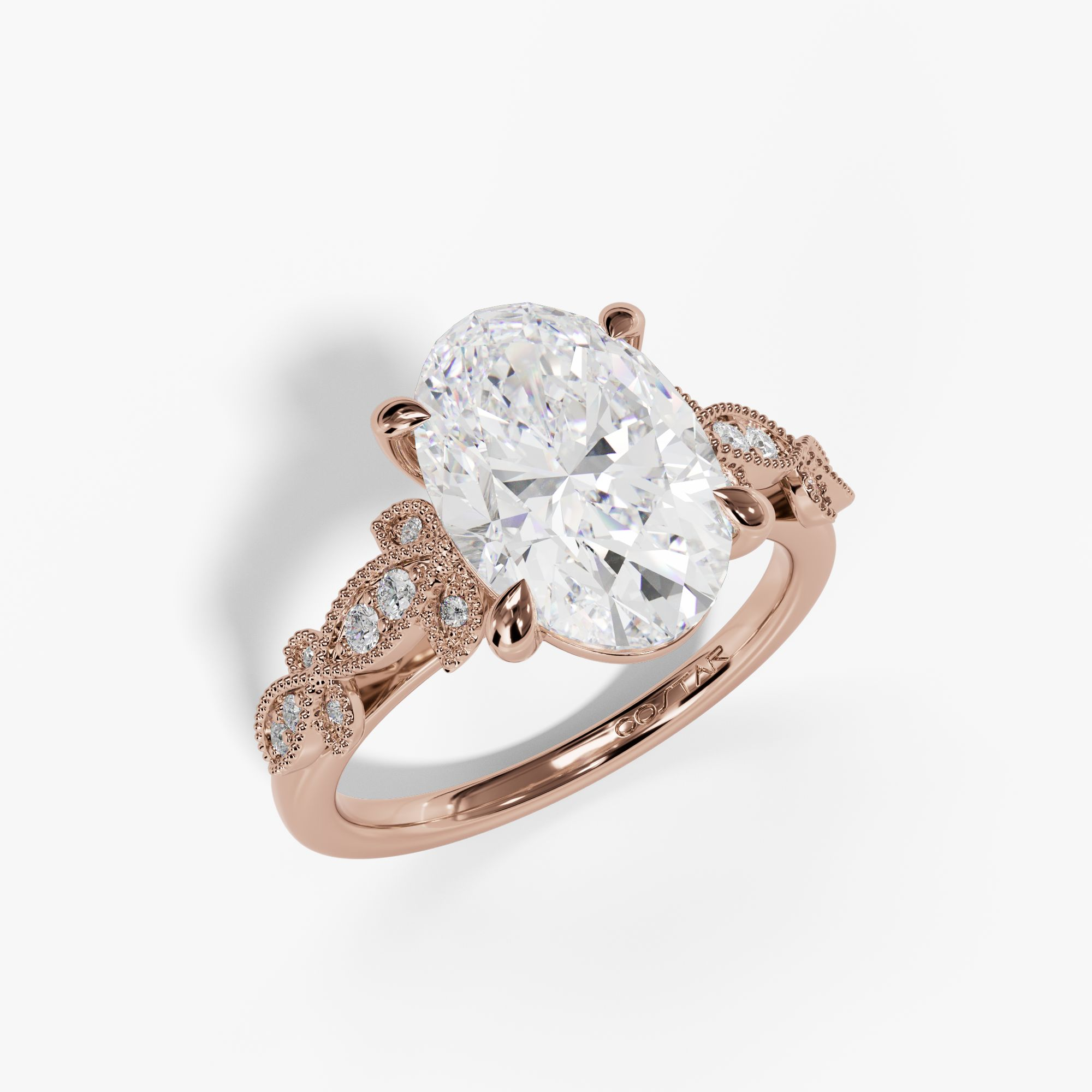 Oval rose gold ring with milgrain leaves, three-quarter view