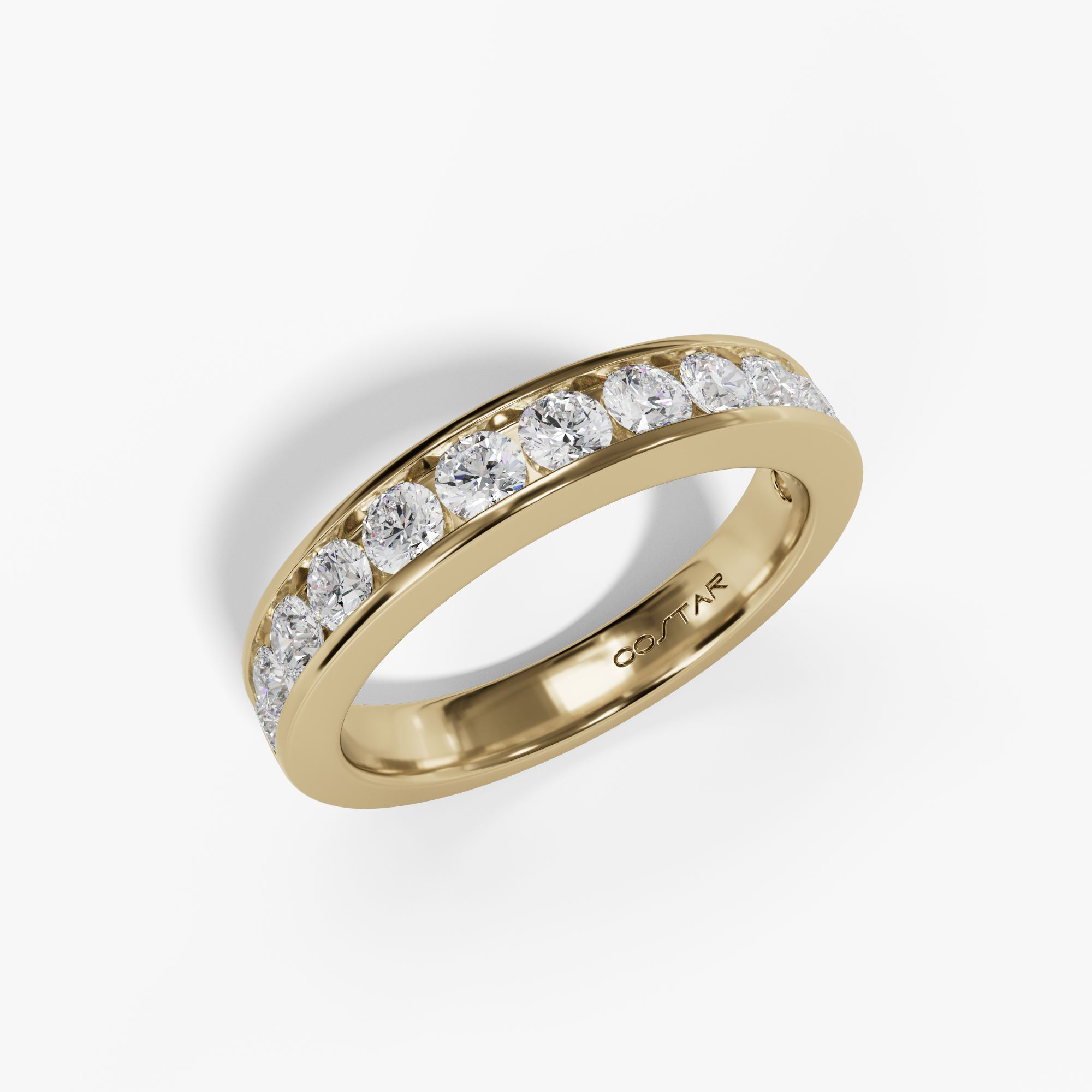 Channel-set round diamond band in yellow gold, angled view