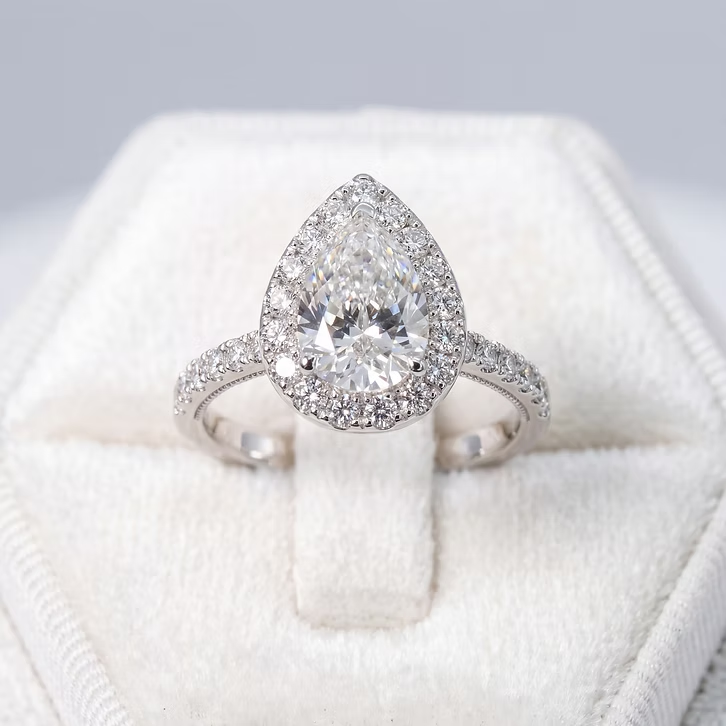 Custom pear shaped diamond ring