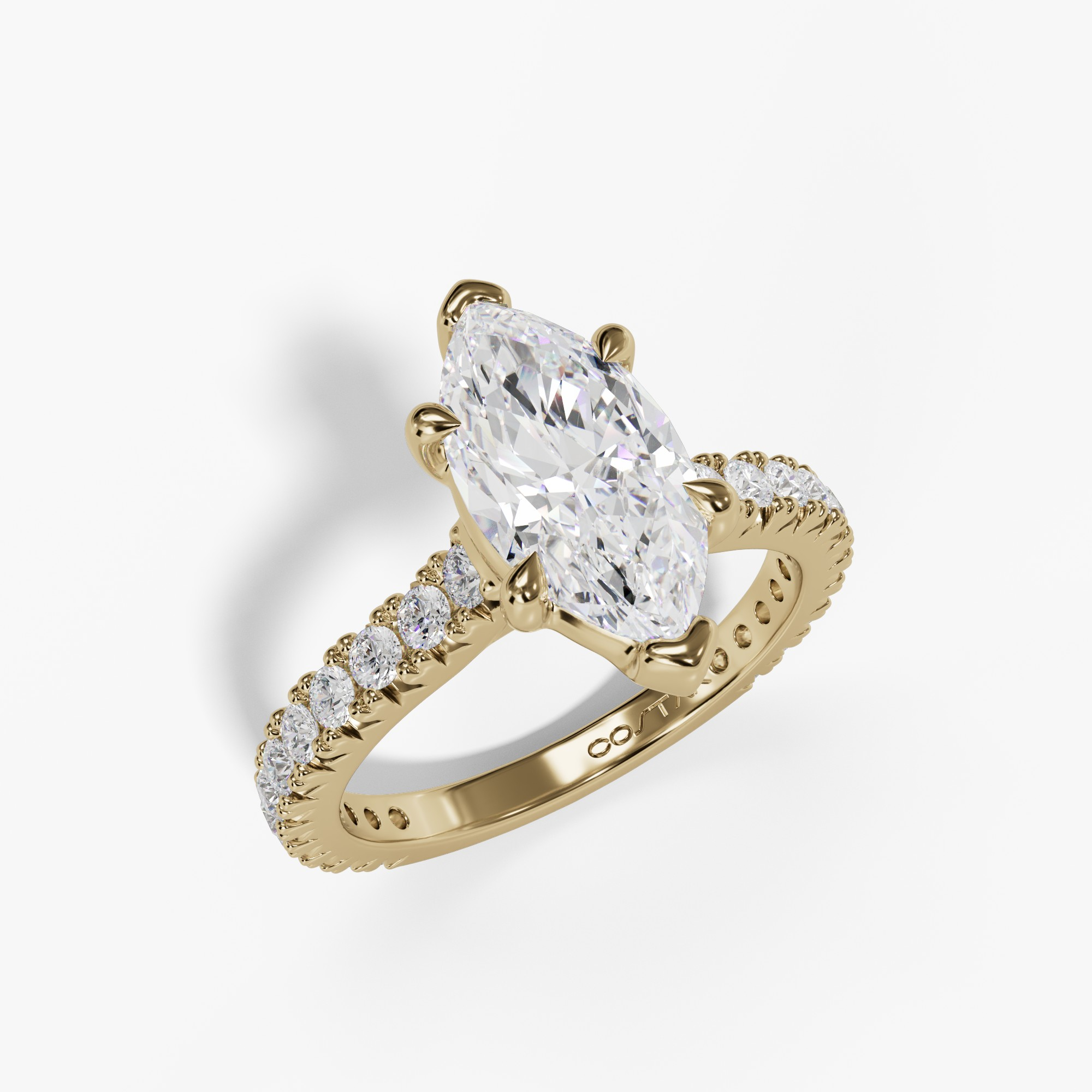 Marquise diamond yellow gold pavé ring, three-quarter view