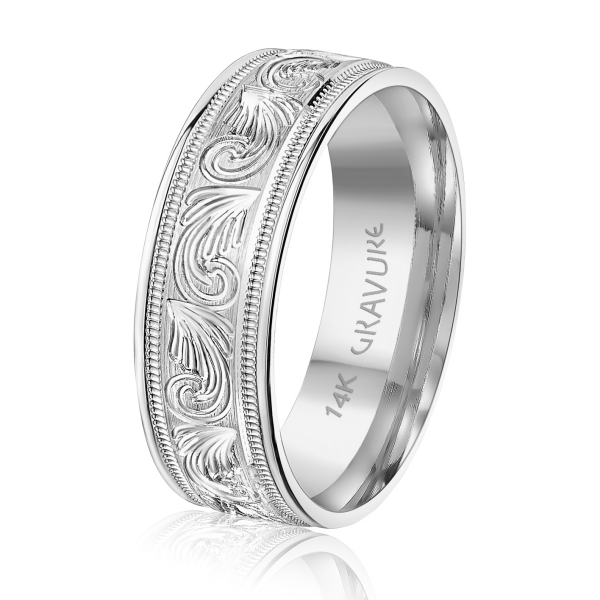 Solid white gold band with raised scroll engraving and milgrain borders