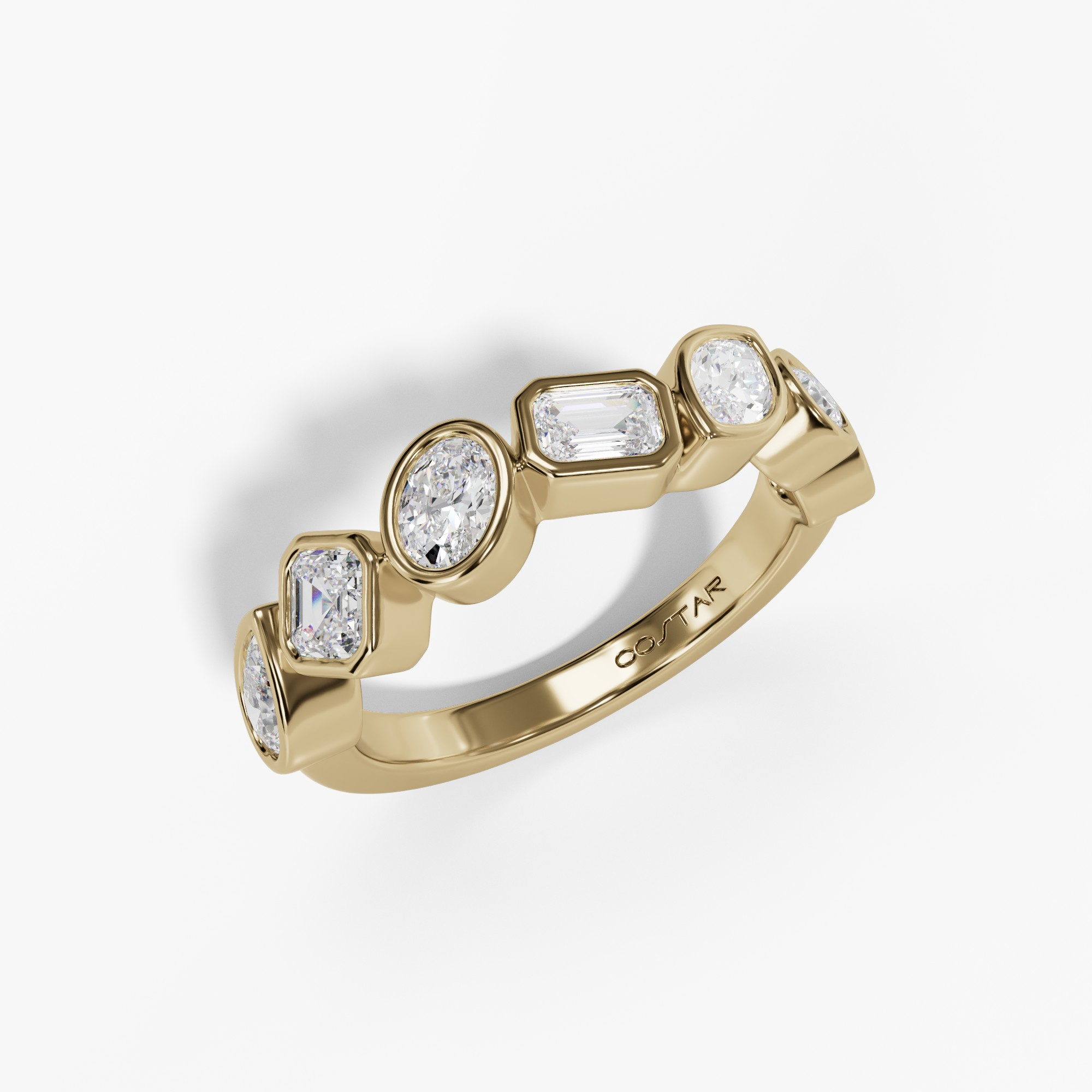 Bezel-set fancy-shape diamond band in yellow gold, angled view