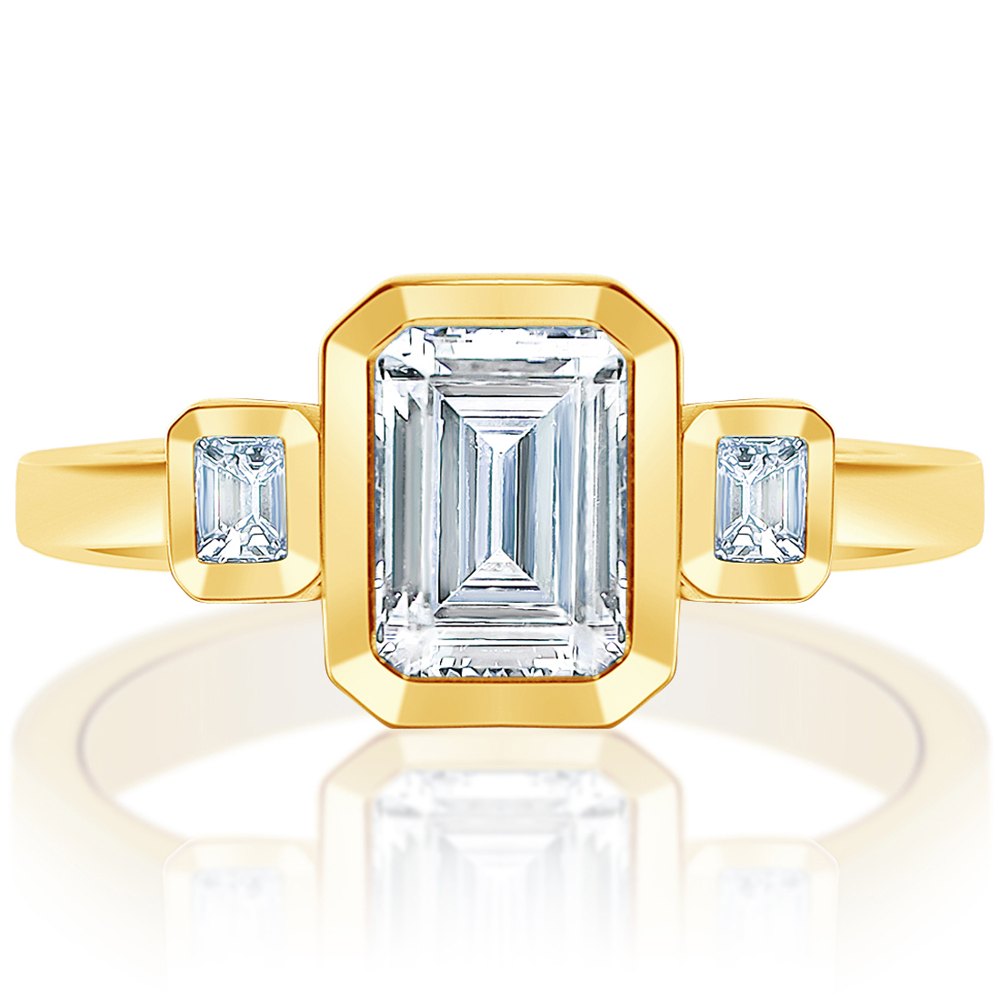 Yellow gold emerald cut bezel three-stone ring, front view