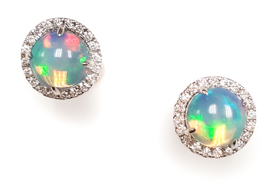 Opal stud earrings with a natural diamond halo in 14K gold