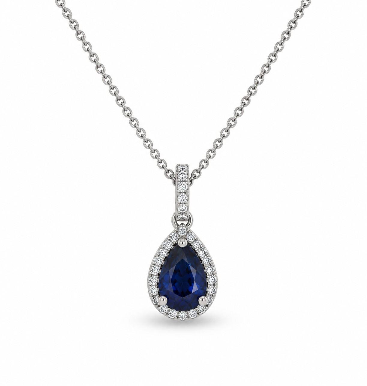 Pear shaped sapphire pendant with natural diamonds in 14K gold