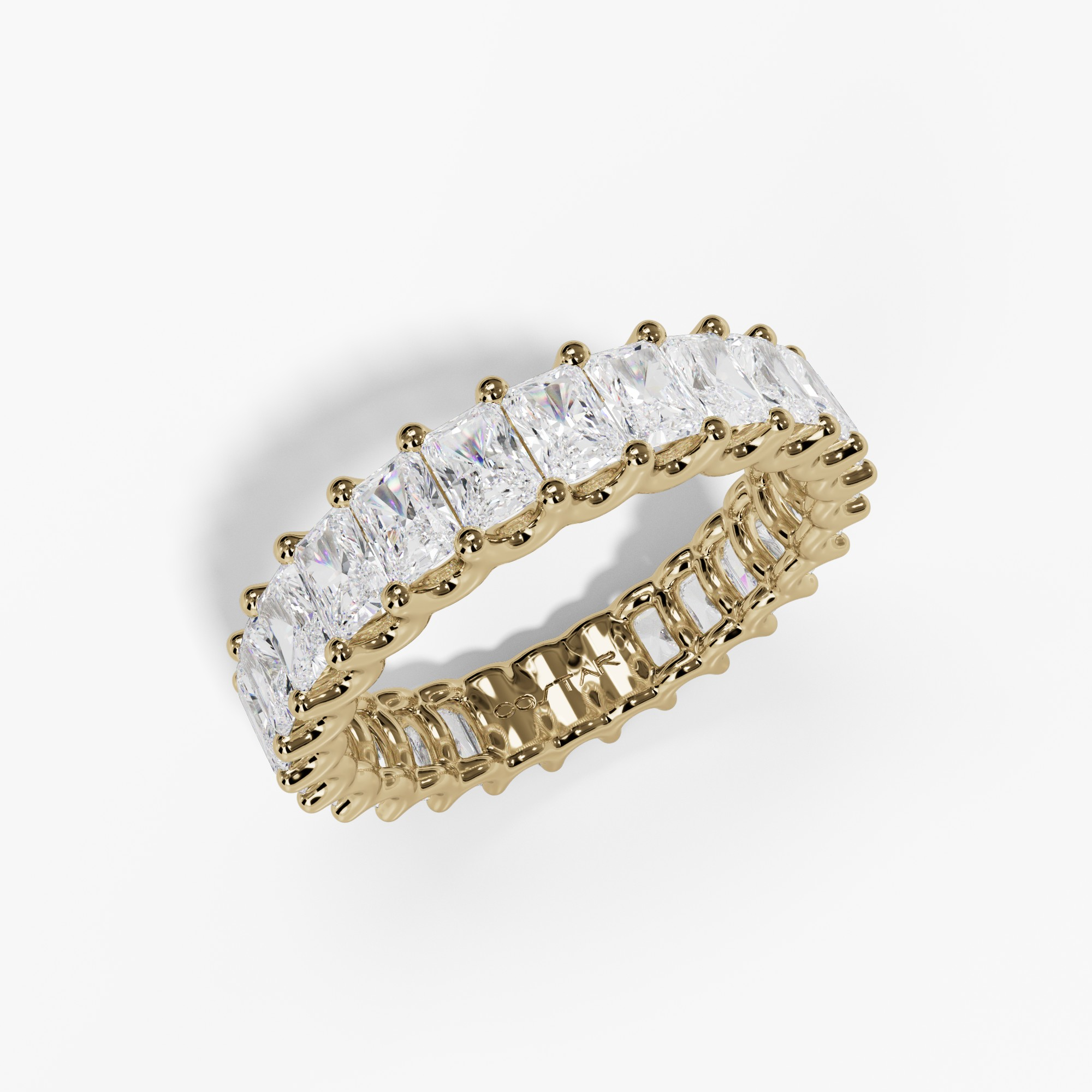 Yellow gold radiant diamond full eternity band, angled view