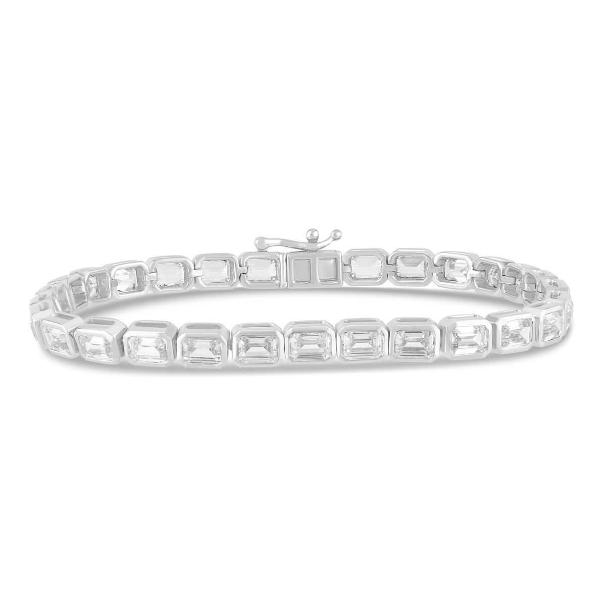 White gold bracelet with a continuous line of emerald cut natural diamonds in full bezel settings