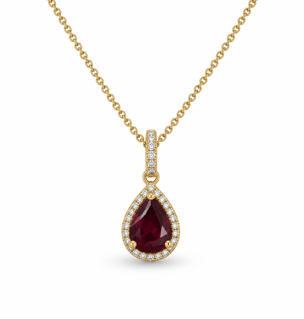 Pear shaped ruby pendant with natural diamonds in 14K yellow gold