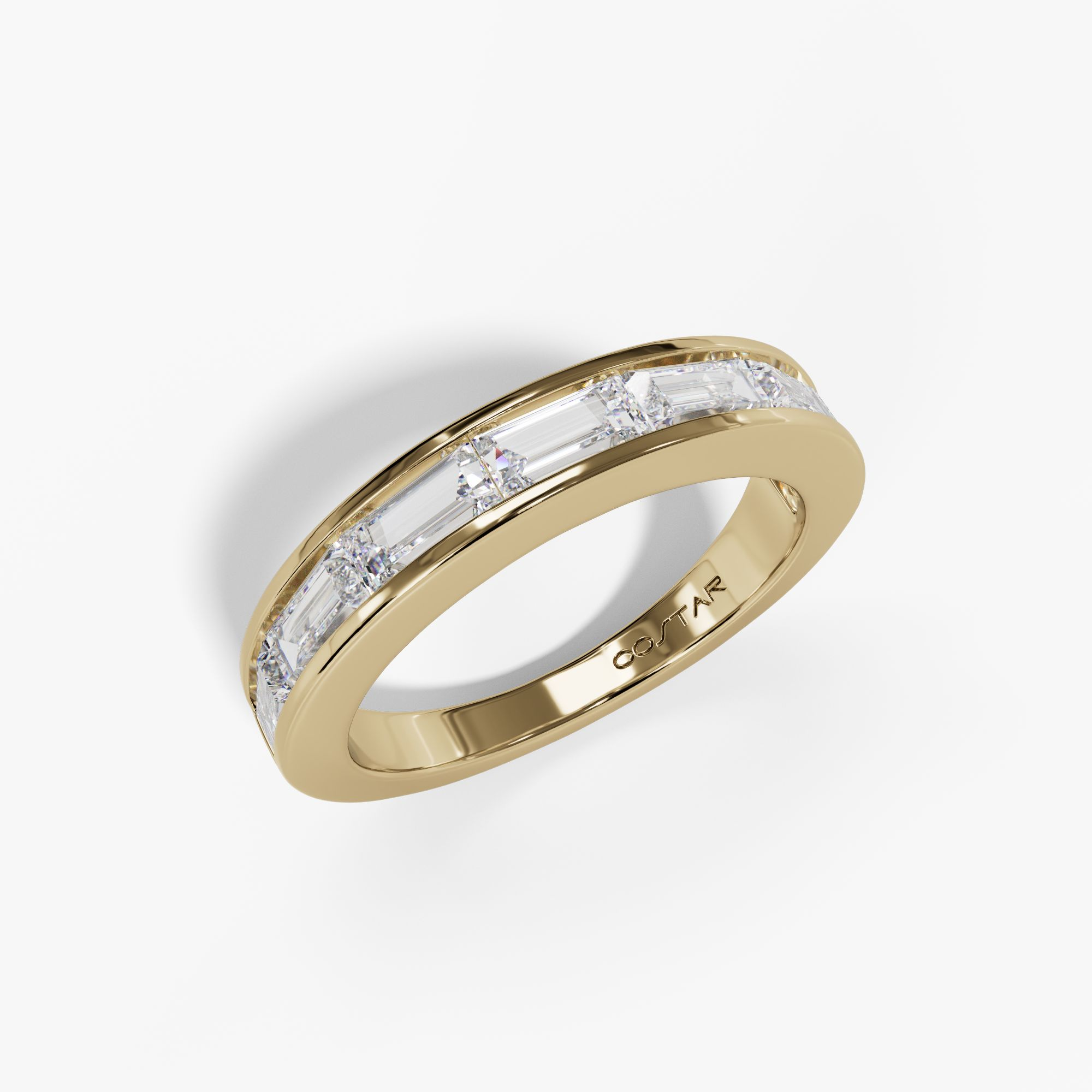 Channel-set baguette diamond band in yellow gold, angled view