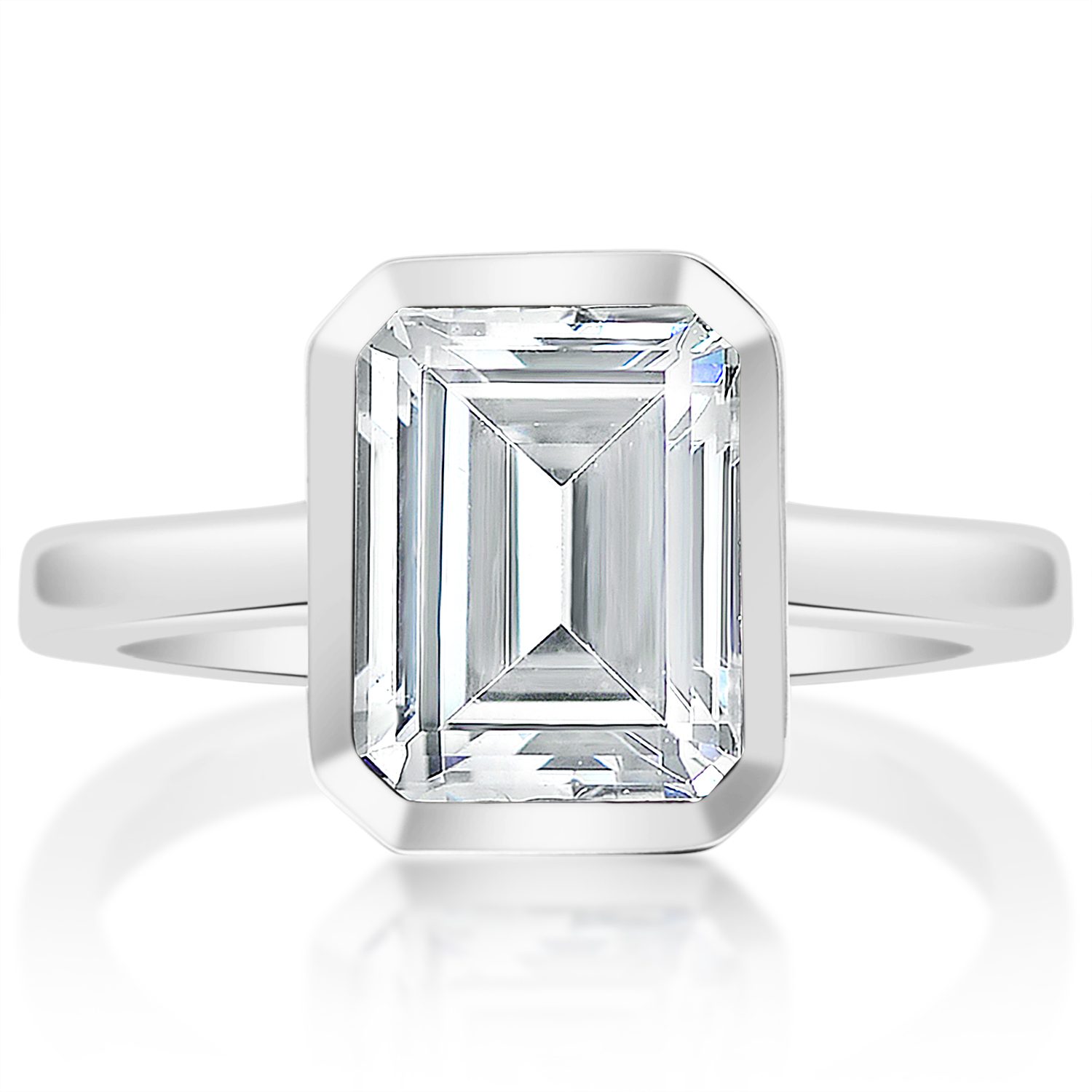 Emerald cut white gold bezel solitaire, front view