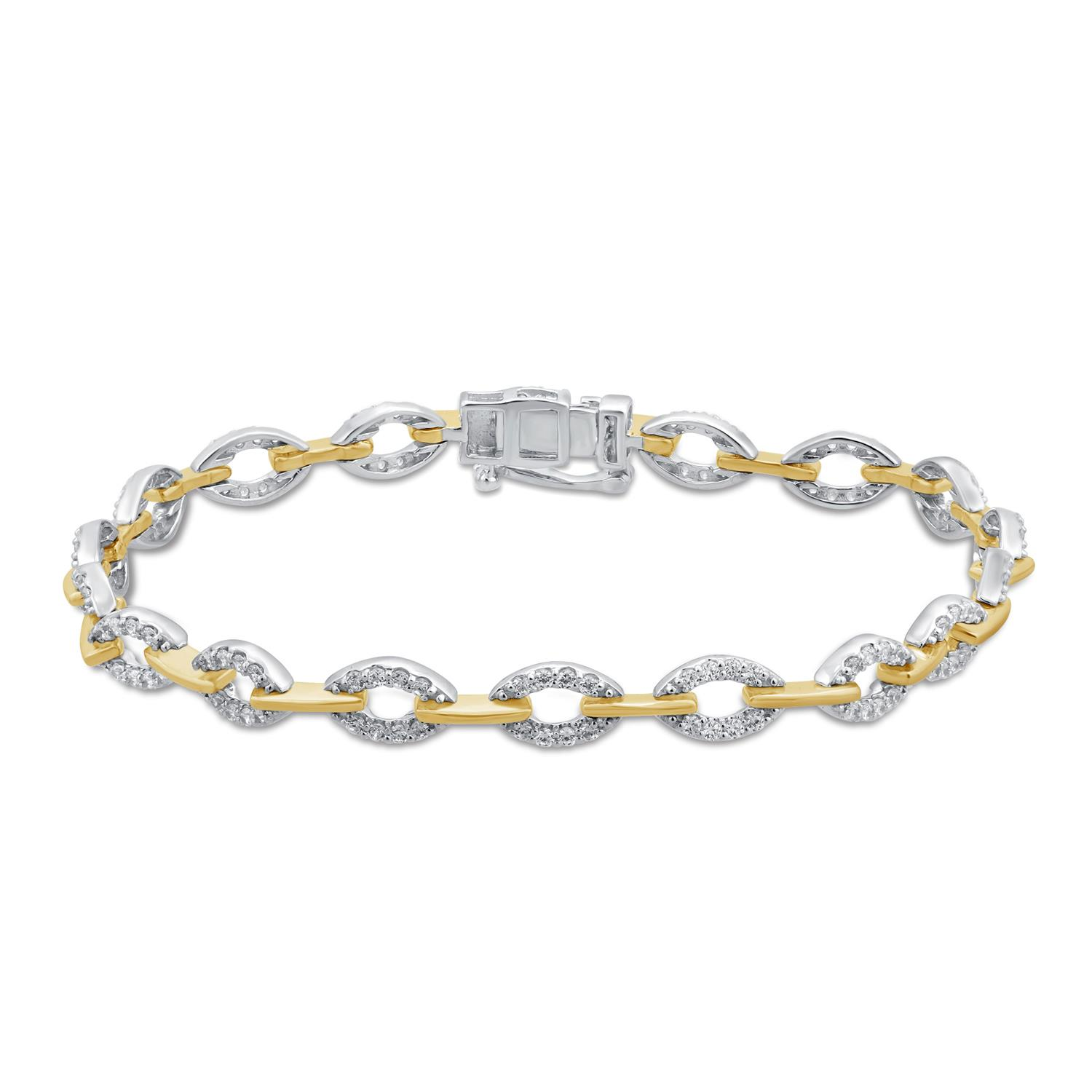 Two tone gold bracelet with pavé set diamond oval links joined by polished yellow gold bar links