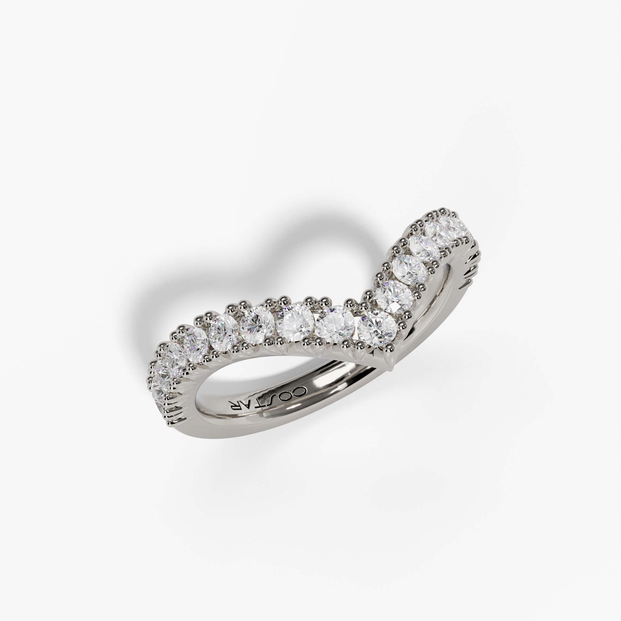 Curved chevron diamond band in white gold, angled view