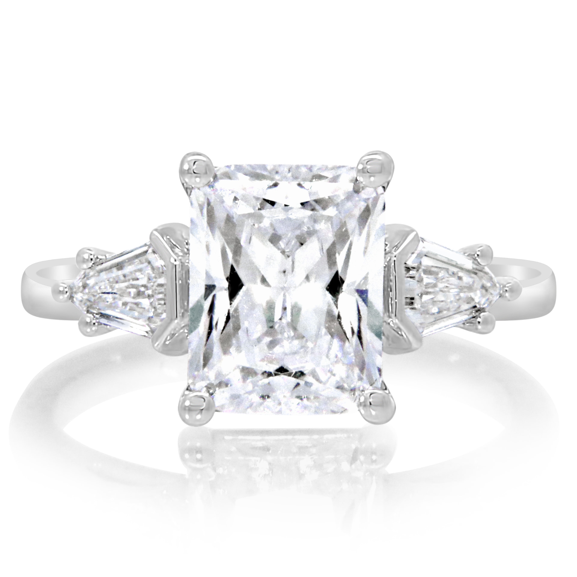 Radiant cut three-stone ring with bullet side stones, front view