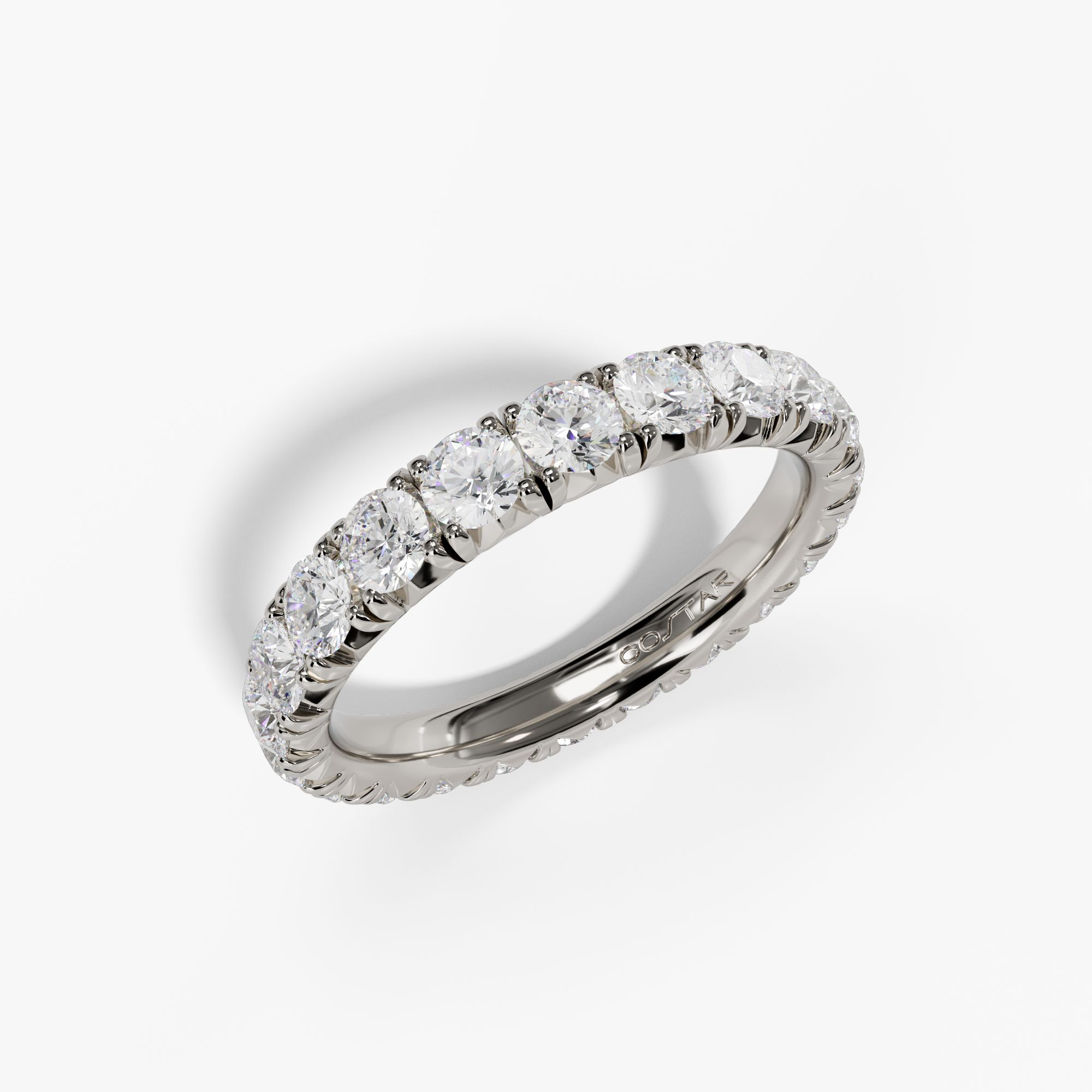 White gold shared-prong full eternity diamond band, angled view