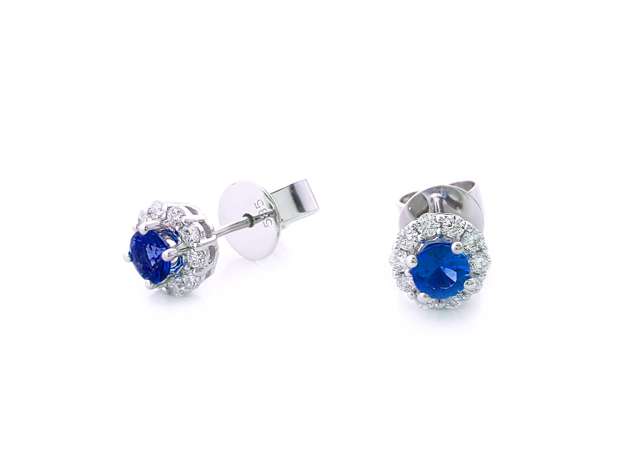 Sapphire stud earrings with a natural diamond halo in 14K gold